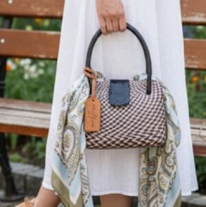 Elegant Black and Tan Woven Handbag